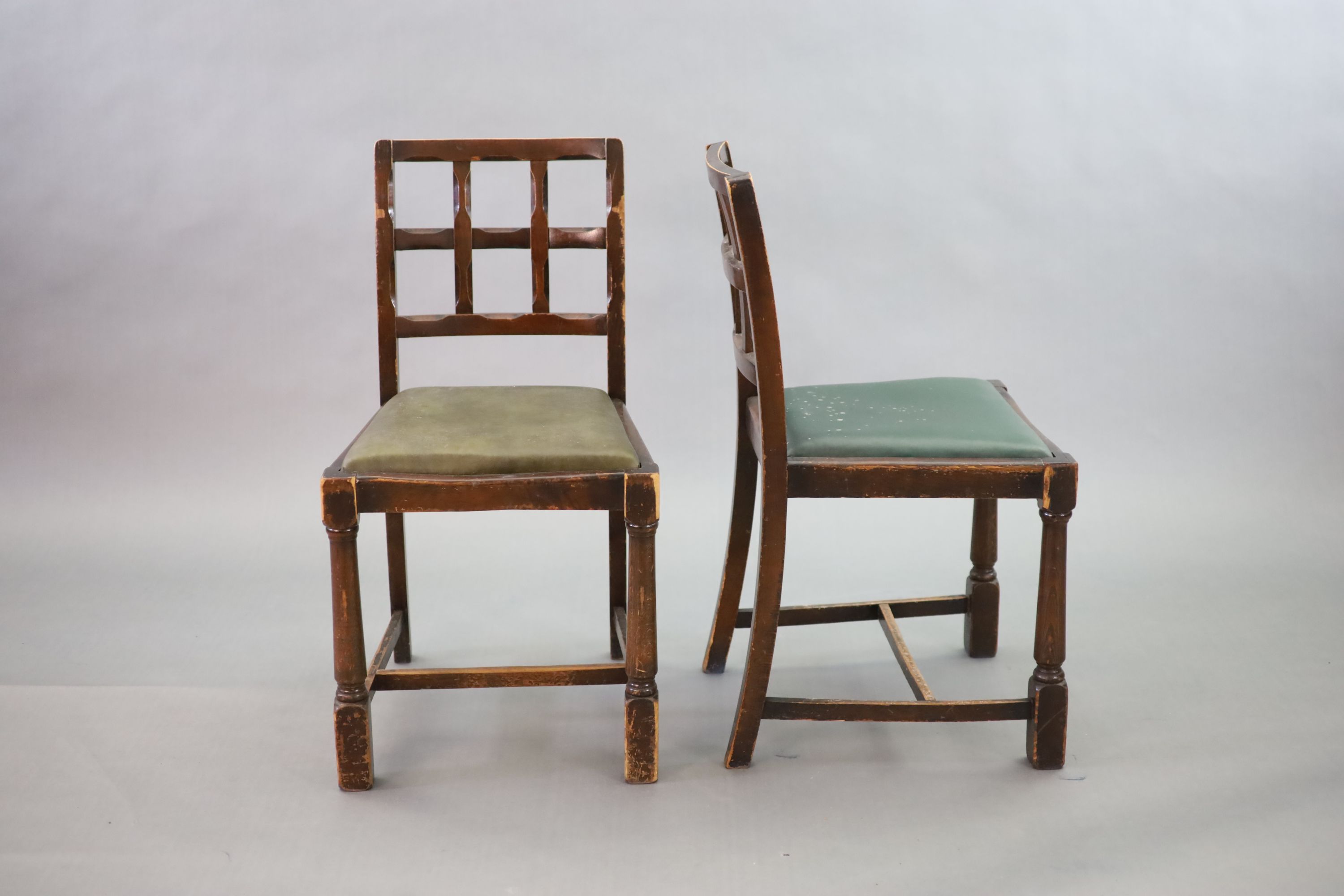 A set of eight early 20th century oak and beech dining chairs